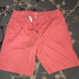Women’s Bermuda style coral/orange shorts